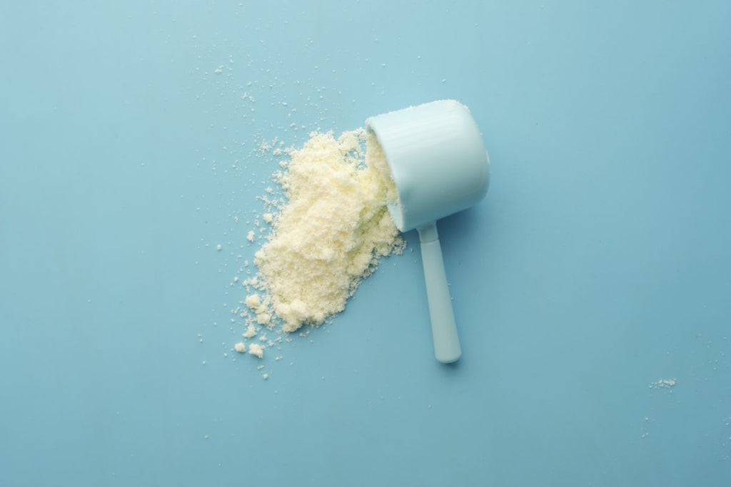 Scoop of unflavored collagen powder
