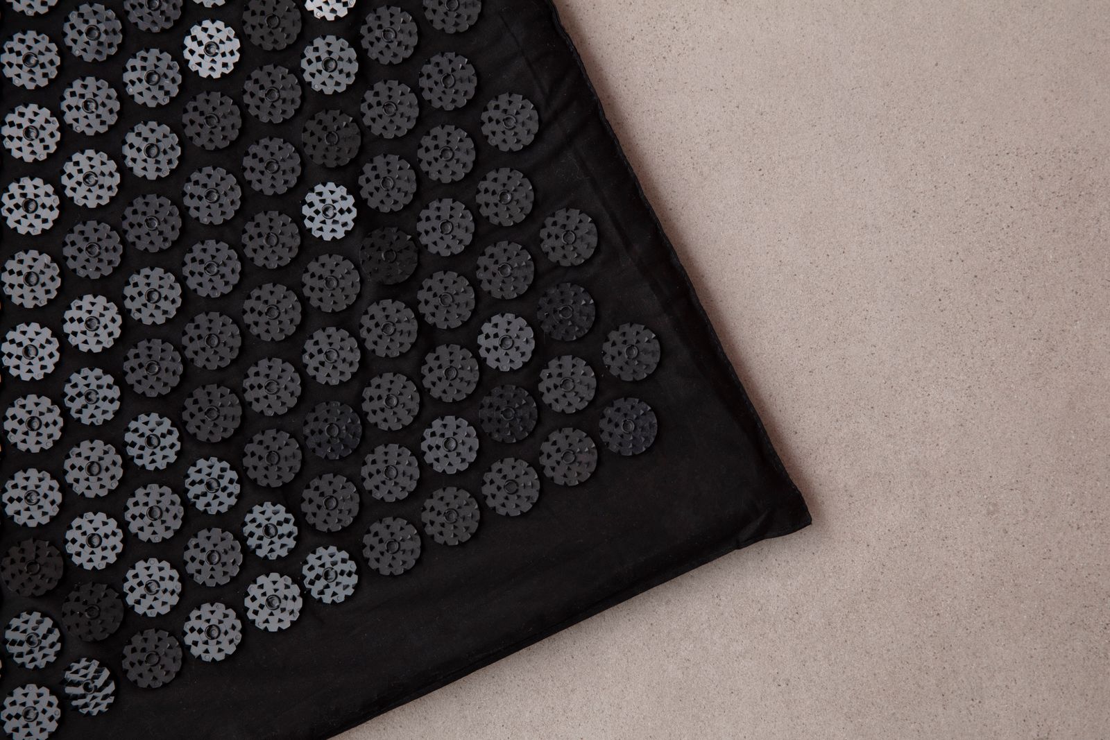 Detailed view of an acupressure mat surface