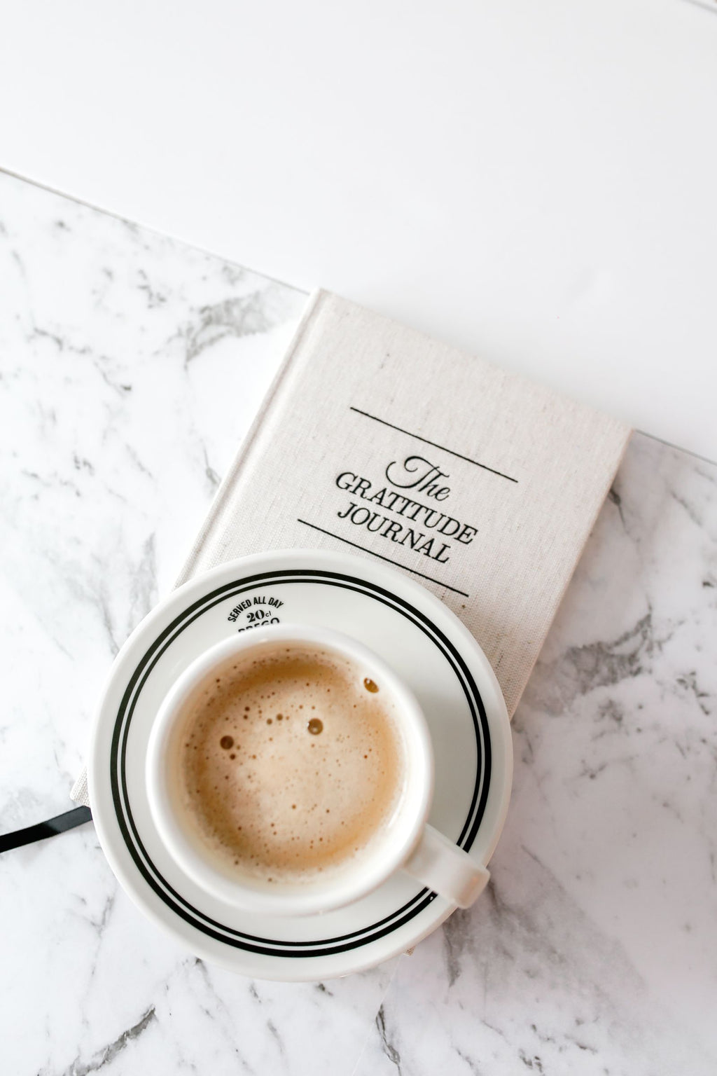 Gratitude journal with morning coffee