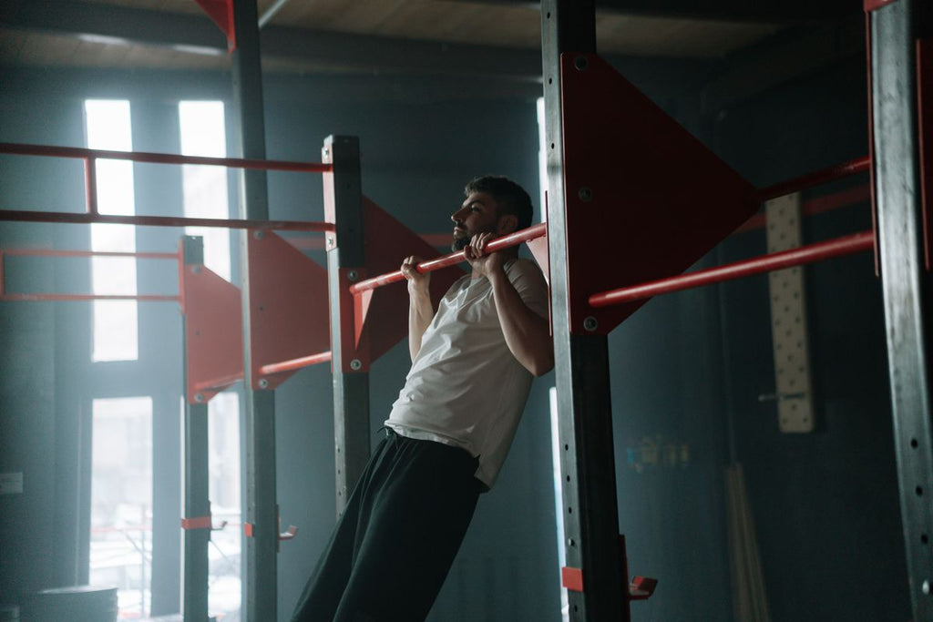 Person doing pull-ups for an upper-body workout
